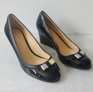 Coach Georgann Peep toe Heels Wedges
Black Patent